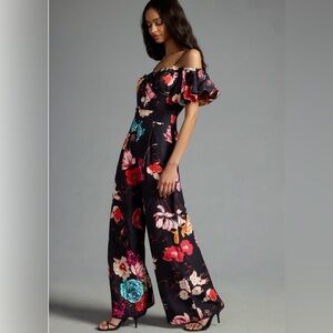 Floral jumpsuit. Linen material. Super flattering and comfy. NWT